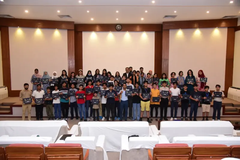 Students receiving certificates, Quantify summer camp 2026